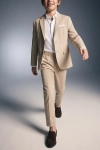 Beige kostuum Liam voor jongens – broek en open colbert, in beweging van voren